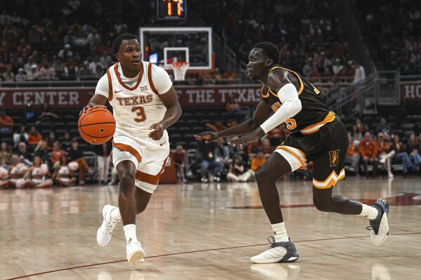 Max Abmas scores season high 23 points as No. 15 Texas beats